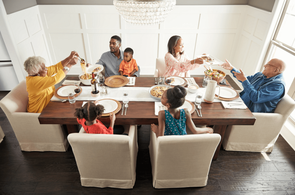Family having breakfast at the dining table | Neils Floor Covering